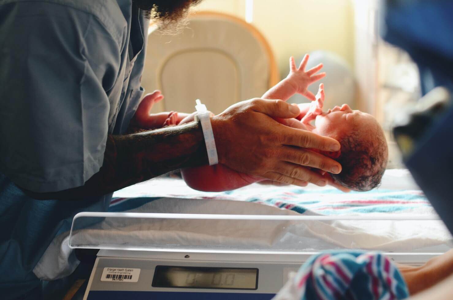 neonatal-nurse-holding-baby